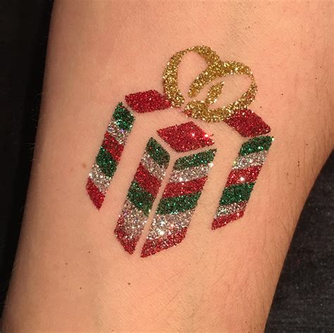 Deck the Skin with Christmas Present Tattoos: Festive Ink Ideas